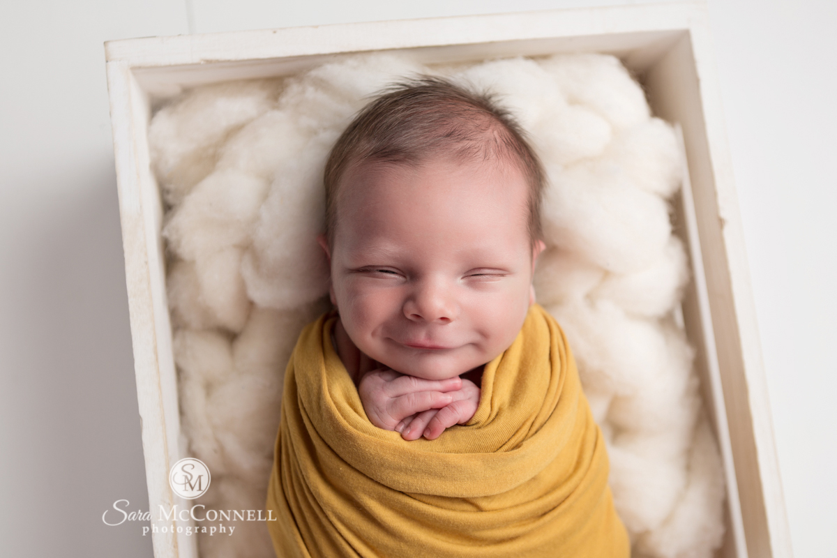 Ottawa Newborn Photography | Smiles and furrowed brows