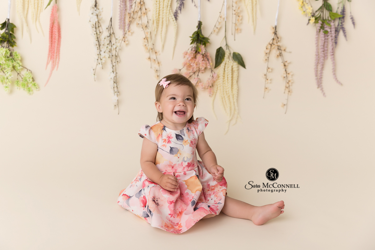 Little girl celebrating her first birthday - photos by Sara McConnell Photography