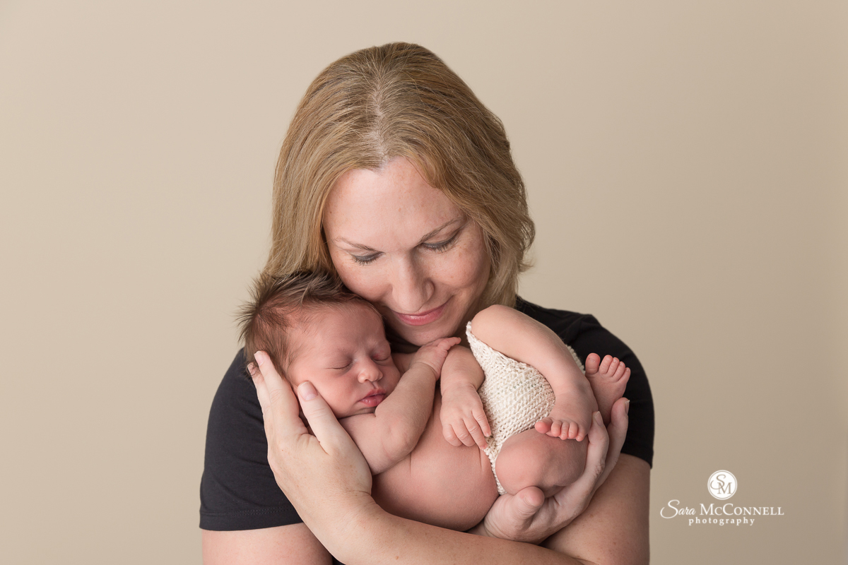 Ottawa Newborn Photos by Sara McConnell Photography - Mom holding newborn baby