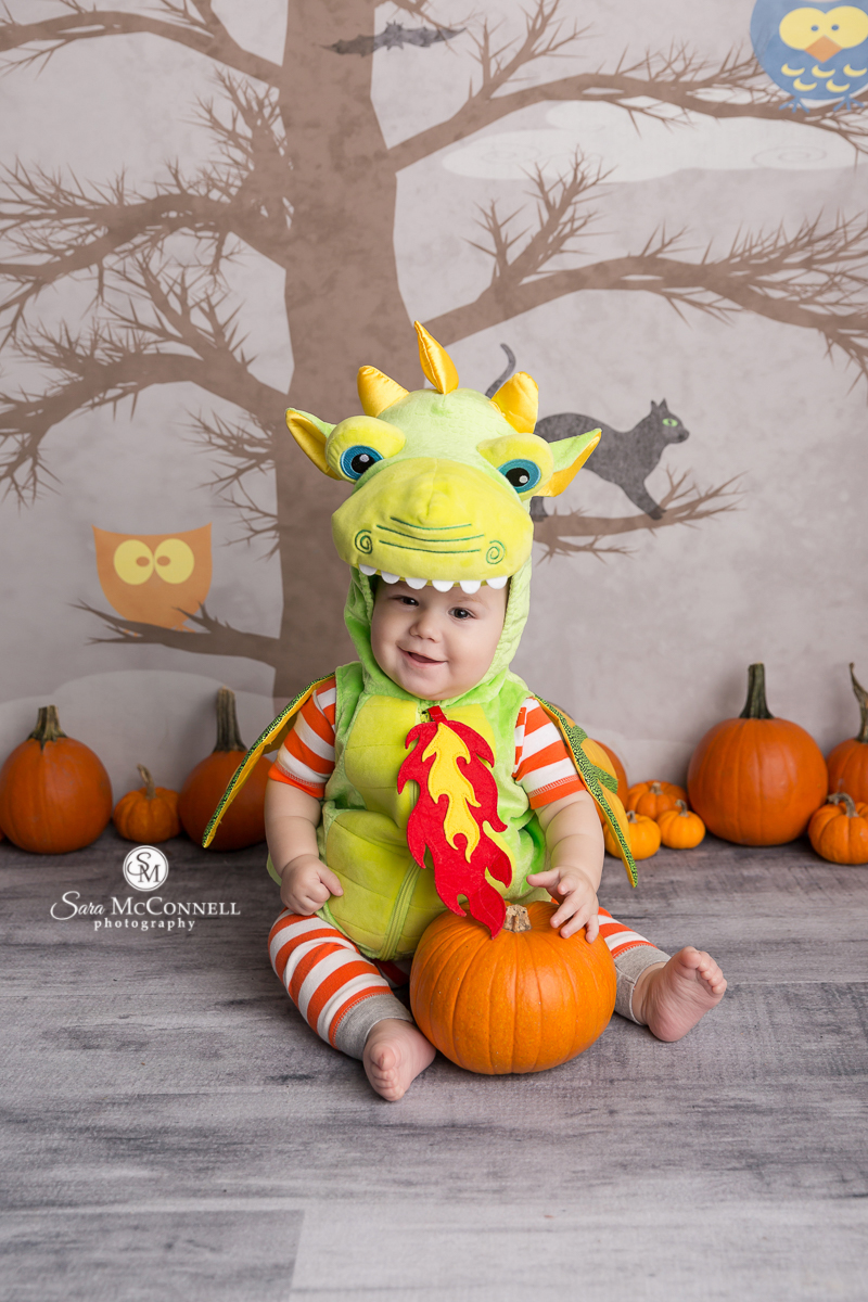 Baby dressed as a dragon