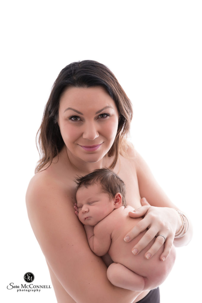 mother holding newborn baby