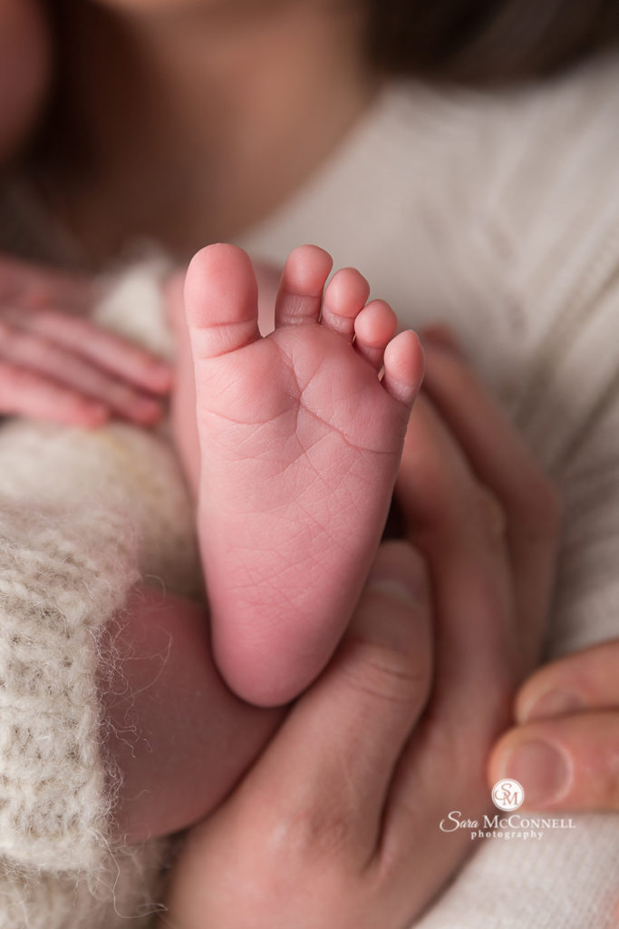 close up of newborn toes