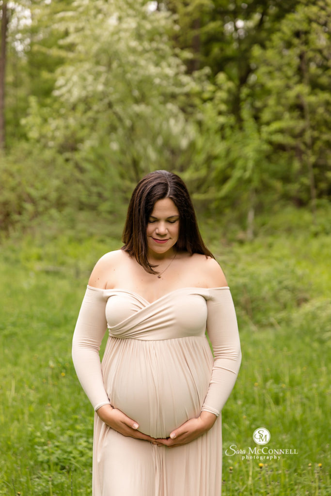 expectant mother in a maternity gown