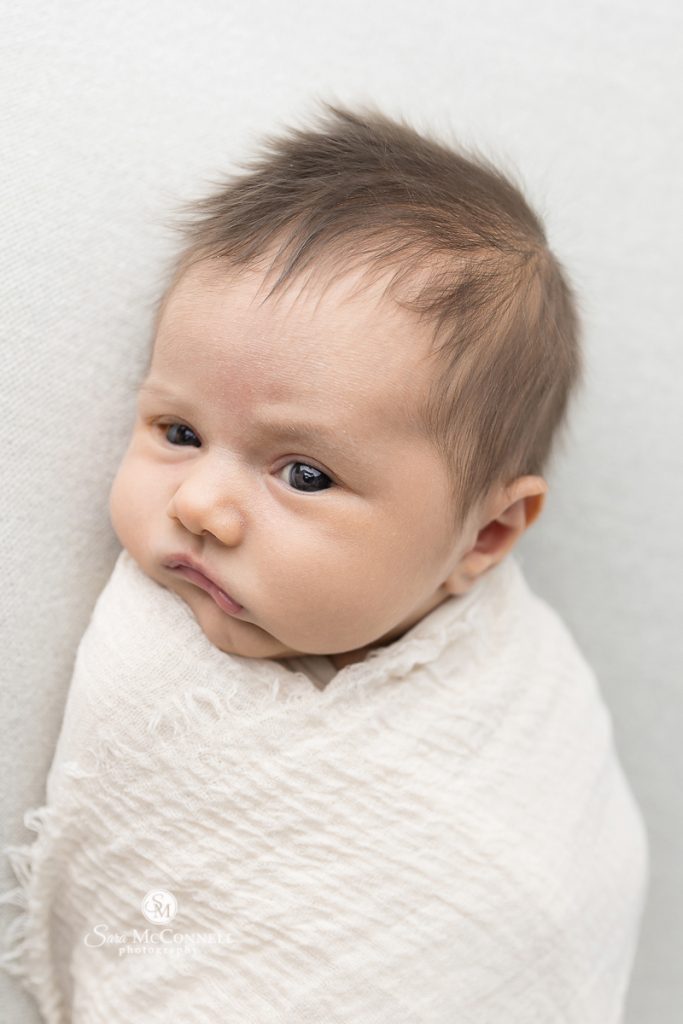 Posing fabric newborn photography